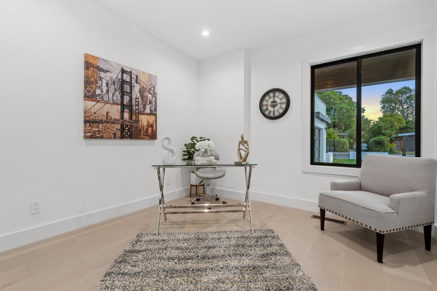 3633 Louis Road Palo Alto, CA 94303 - Photo 19 of 42 a living room with furniture and a window