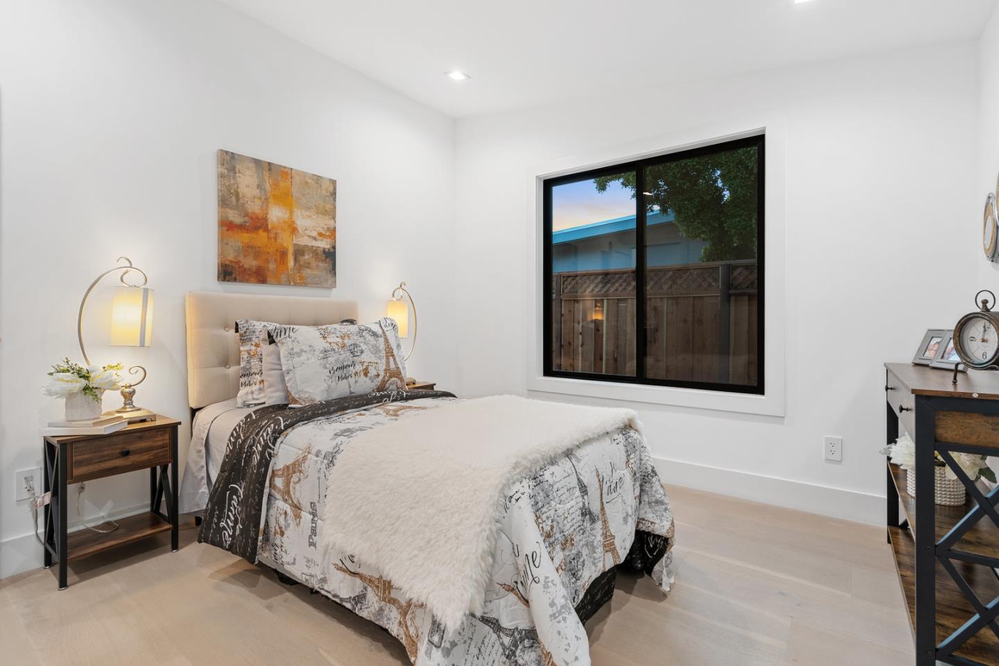 3633 Louis Road Palo Alto, CA 94303 - Photo 21 of 42 a bedroom with a bed and a window