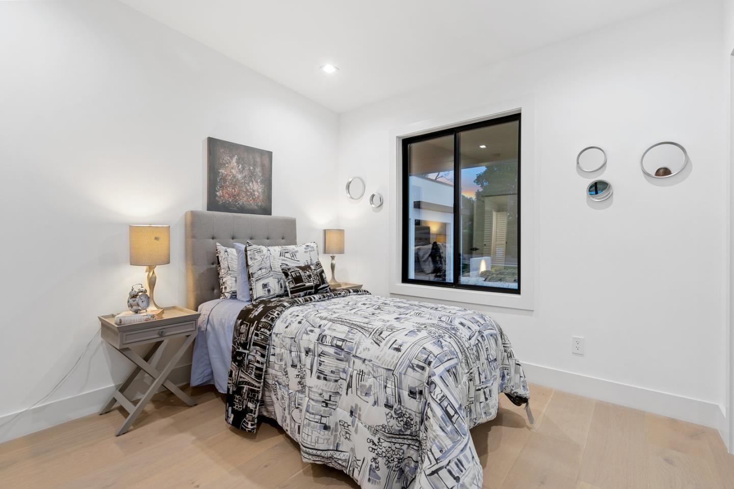 3633 Louis Road Palo Alto, CA 94303 - Photo 24 of 42 a bedroom with a bed and a window