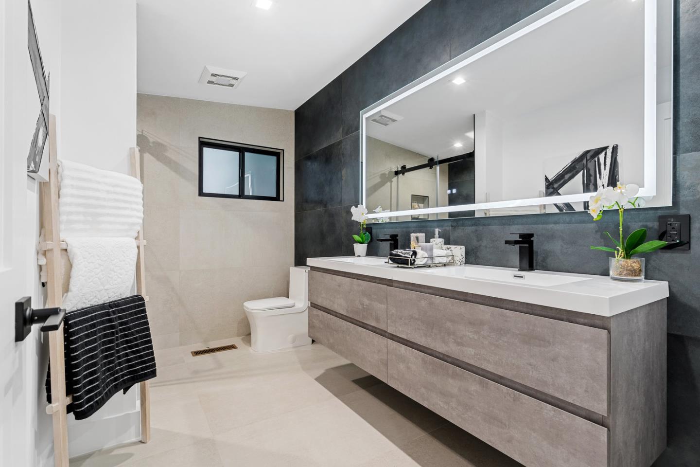 3633 Louis Road Palo Alto, CA 94303 - Photo 32 of 42 a bathroom with a sink and a mirror
