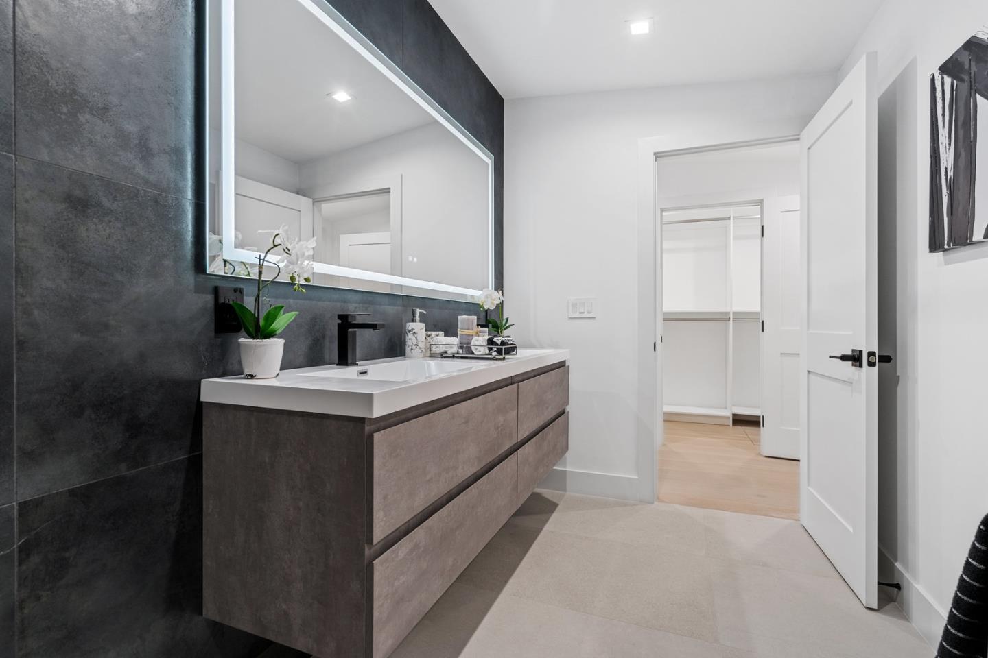 3633 Louis Road Palo Alto, CA 94303 - Photo 34 of 42 a bathroom with a sink and a mirror