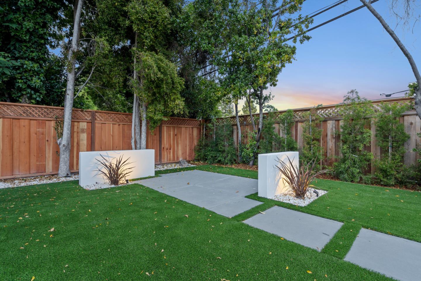3633 Louis Road Palo Alto, CA 94303 - Photo 40 of 42 a view of a garden with a slide