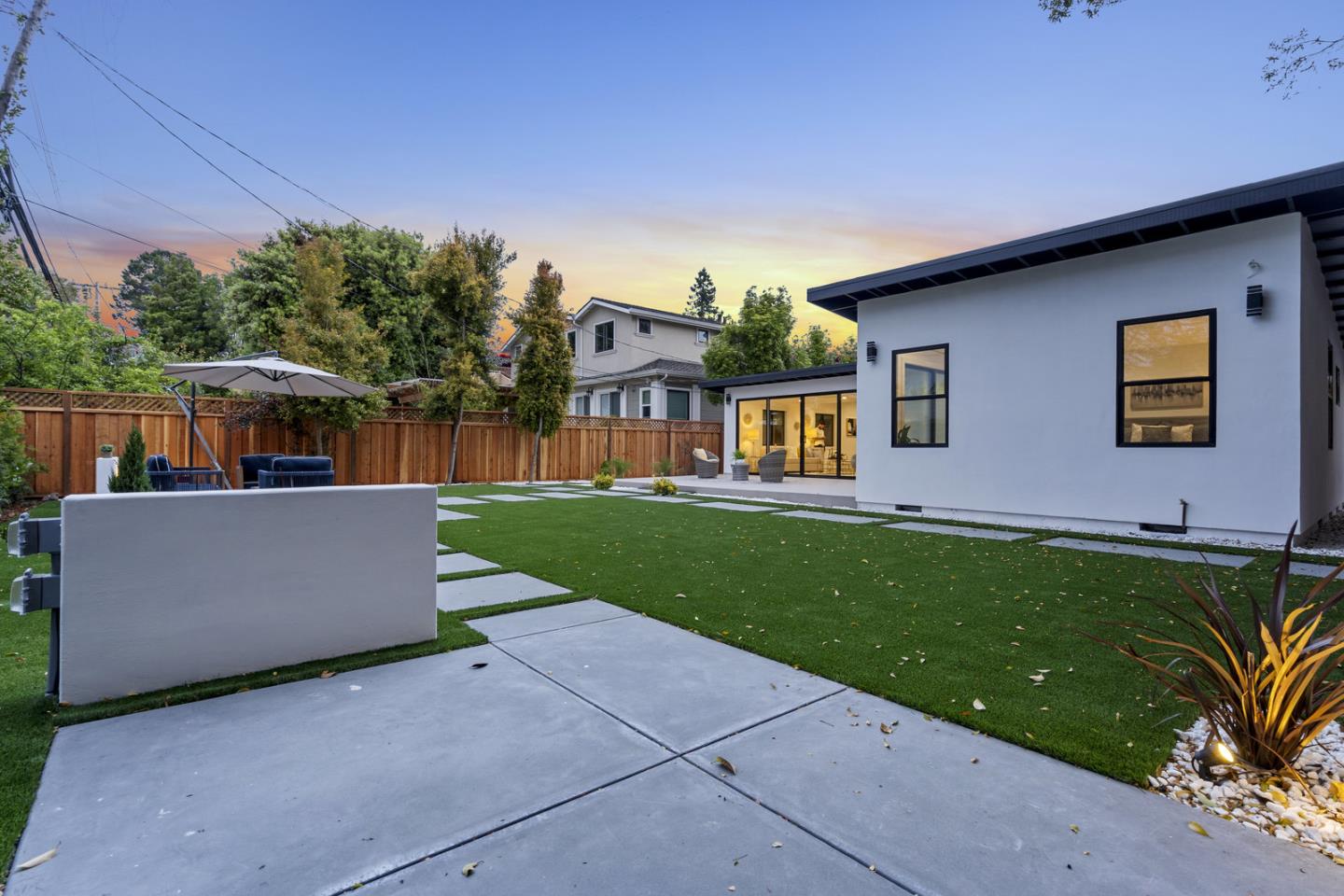 3633 Louis Road Palo Alto, CA 94303 - Photo 41 of 42 a front view of house with yard and green space