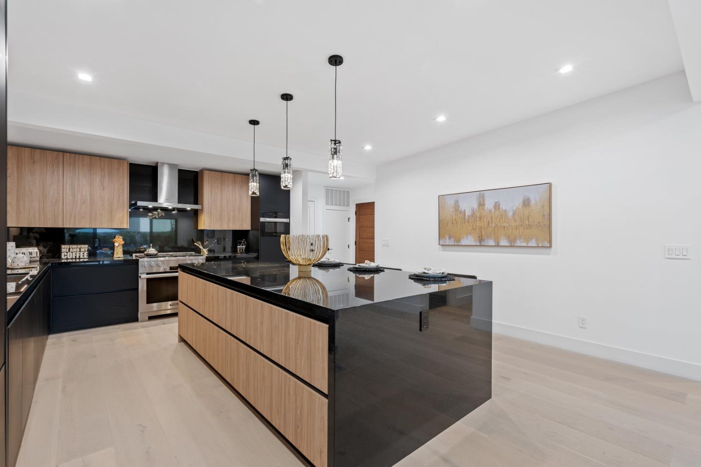 3633 Louis Road Palo Alto, CA 94303 - Photo 5 of 42 a kitchen with granite countertop a sink and cabinets