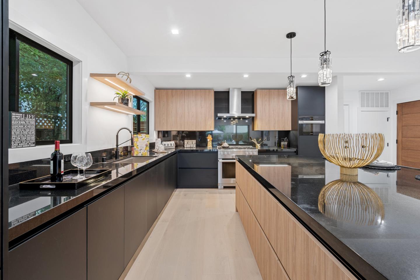 3633 Louis Road Palo Alto, CA 94303 - Photo 6 of 42 a large kitchen with kitchen island granite countertop a large counter top appliances and cabinets