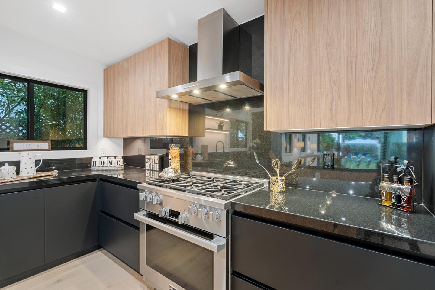 3633 Louis Road Palo Alto, CA 94303 - Photo 7 of 42 a kitchen with a sink and a stove top oven