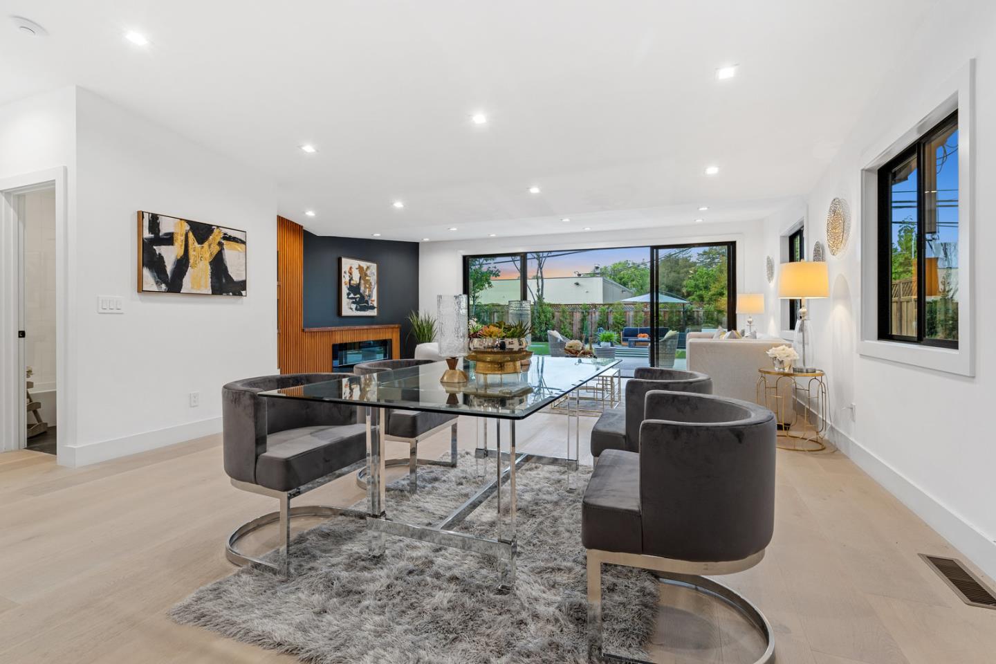 3633 Louis Road Palo Alto, CA 94303 - Photo 8 of 42 a living room with furniture and a large window