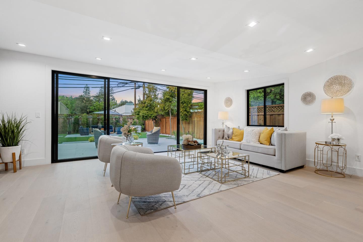 3633 Louis Road Palo Alto, CA 94303 - Photo 10 of 42 a living room with furniture and a large window
