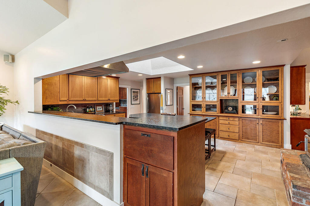 3828 Upper Applegate Road Jacksonville, OR 97530 - Photo 24 of 69 a kitchen with lots of counter top space and appliances