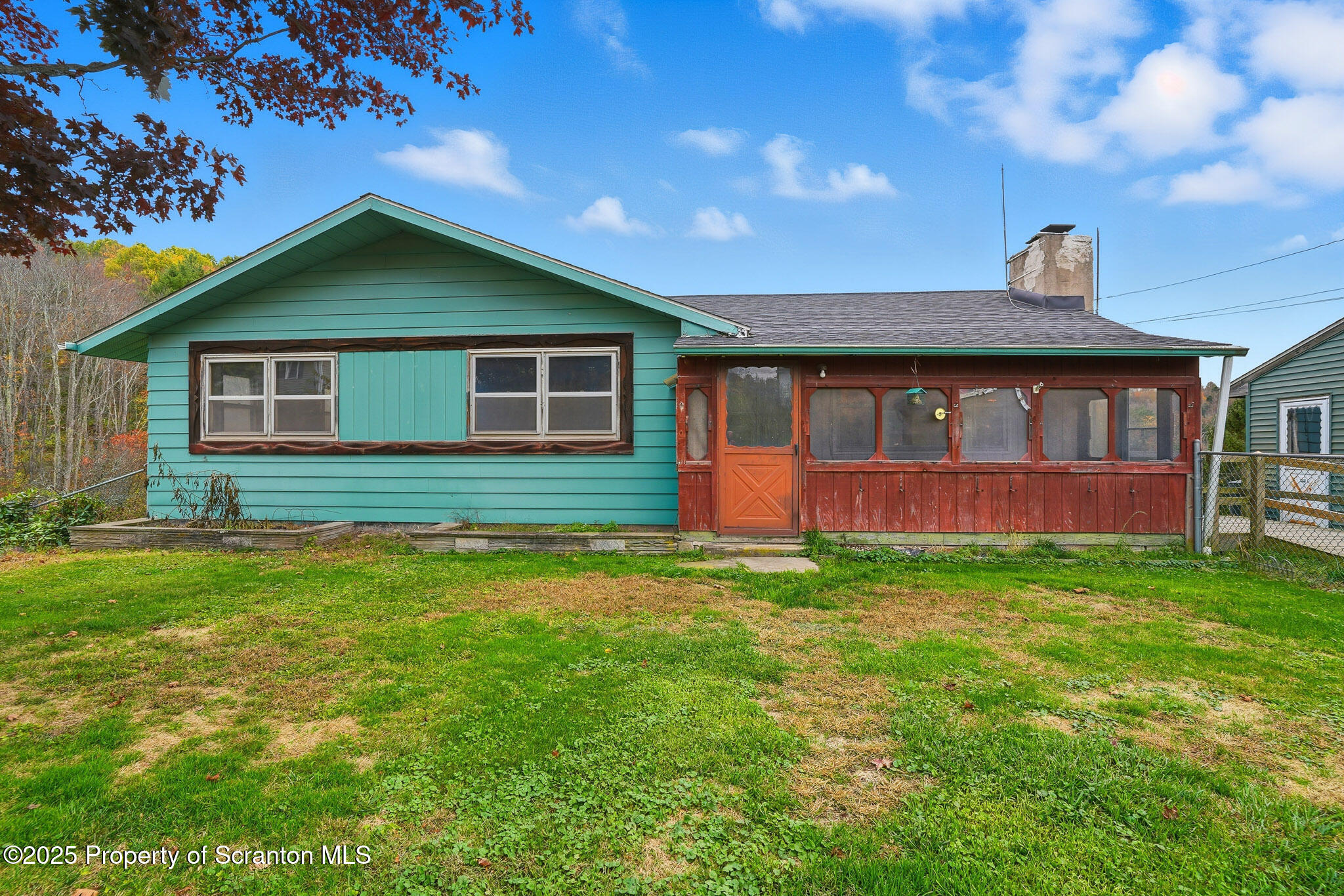 a front view of a house with yard