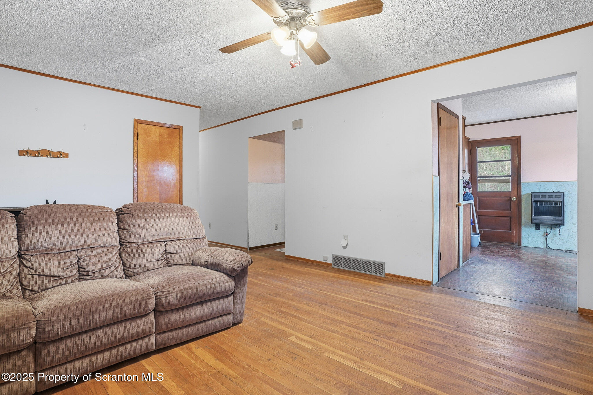 330 Pedrick Road Nicholson, PA 18446 - Photo 12 of 55 a living room with furniture and a wooden floor