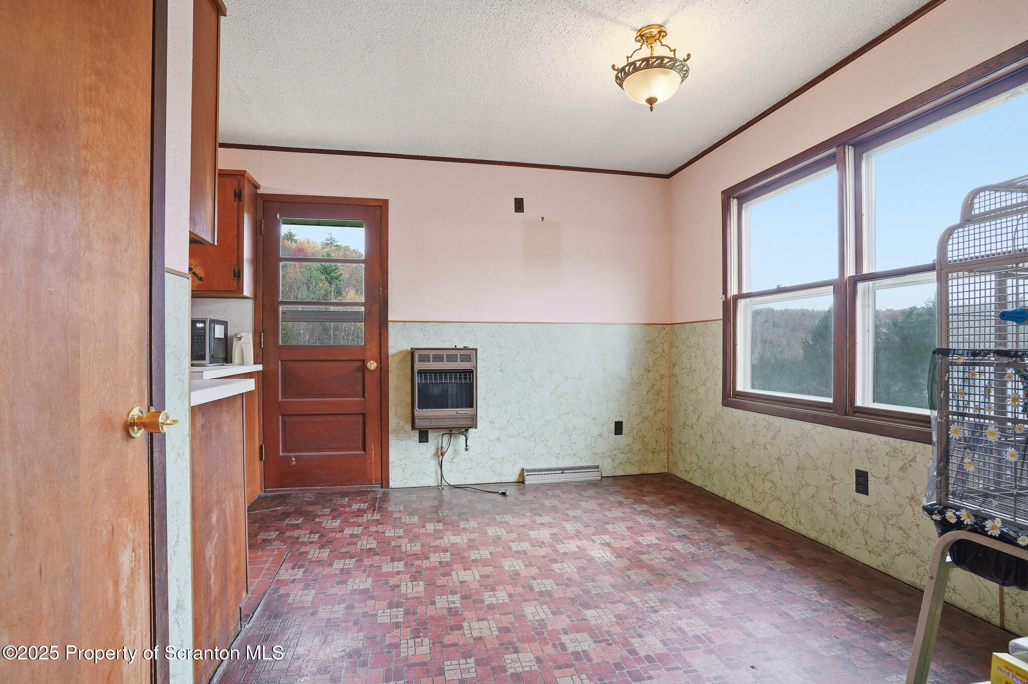 330 Pedrick Road Nicholson, PA 18446 - Photo 13 of 55 a view of an empty room with a window