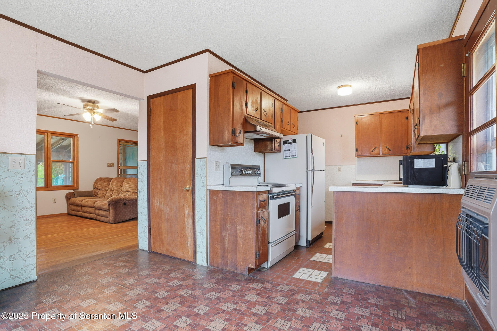 330 Pedrick Road Nicholson, PA 18446 - Photo 15 of 55 a kitchen with stainless steel appliances granite countertop a refrigerator a stove a sink and a oven