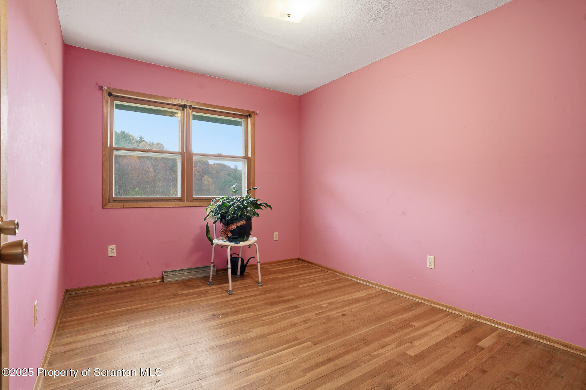 330 Pedrick Road Nicholson, PA 18446 - Photo 20 of 55 a view of a room with wooden floor and a window