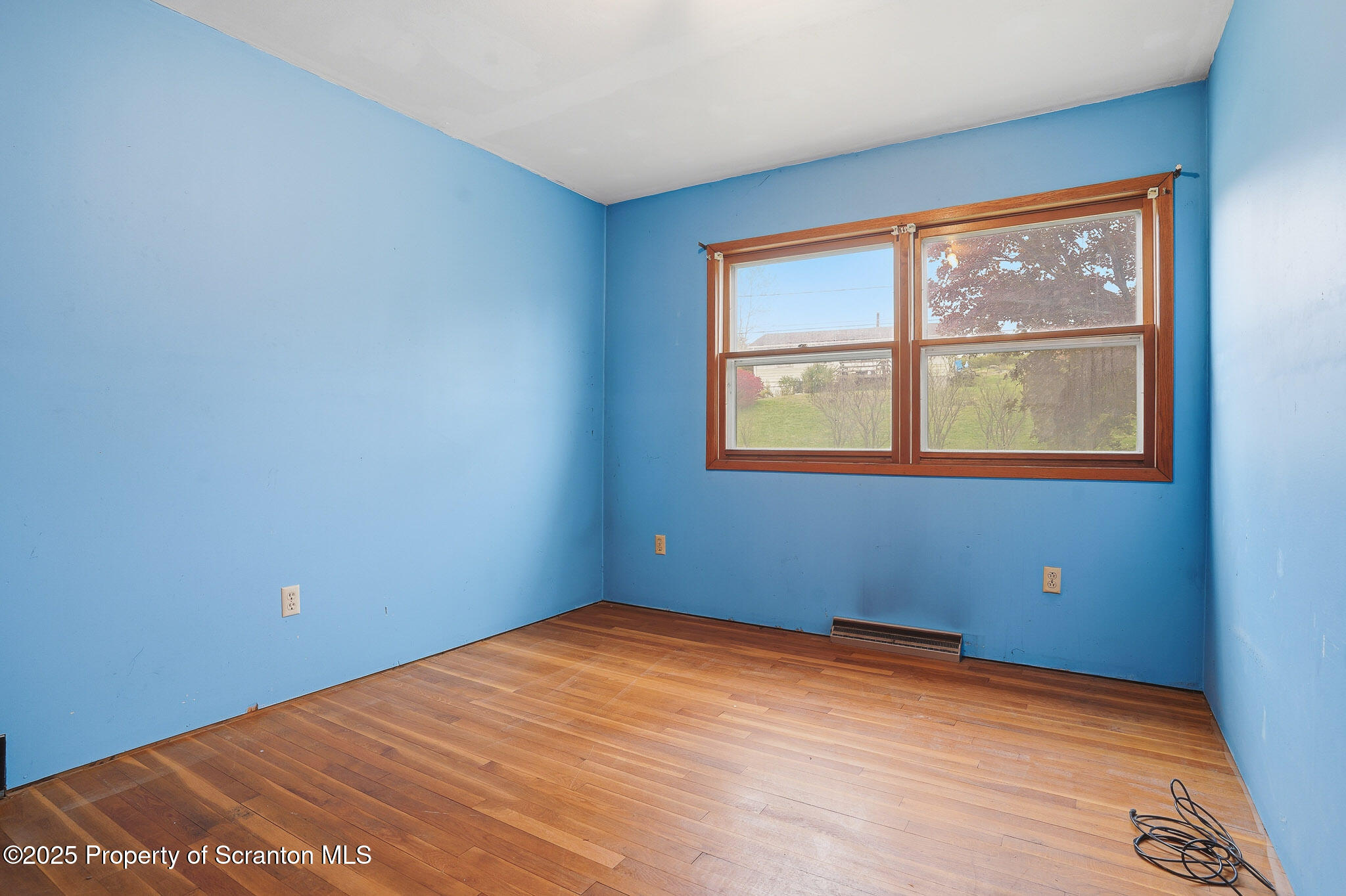 330 Pedrick Road Nicholson, PA 18446 - Photo 23 of 55 a view of an empty room with a window
