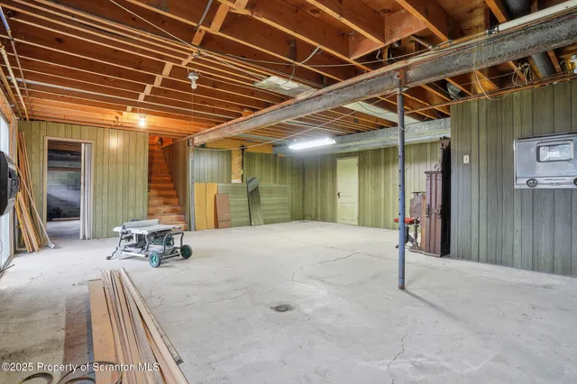 a view of a garage with wooden wall