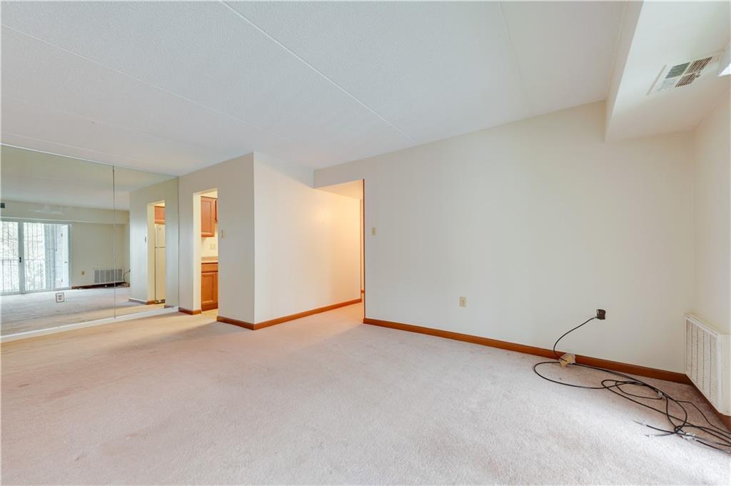 2160 Greentree Road, Unit 401W Pittsburgh, PA 15220 - Photo 5 of 23 an empty room with a natural light