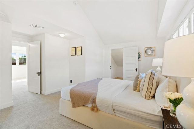 a view of a patio with wooden floor