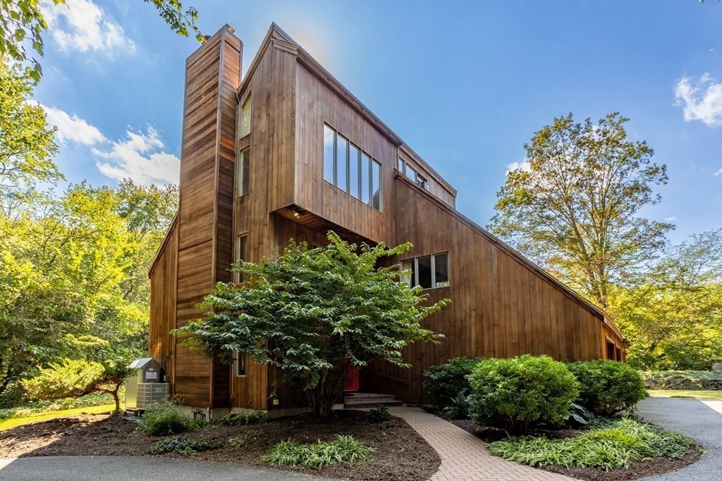 115 South Meadow Road Lancaster, MA 01523 - Photo 1 of 42 a view of a house with a tree