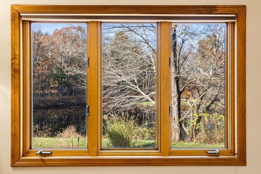 115 South Meadow Road Lancaster, MA 01523 - Photo 27 of 42 a view of a glass door with a glass door