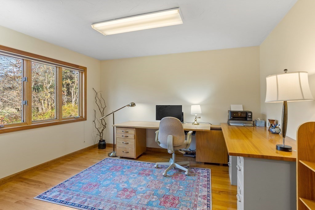 115 South Meadow Road Lancaster, MA 01523 - Photo 28 of 42 a bed room with a bed furniture and a window