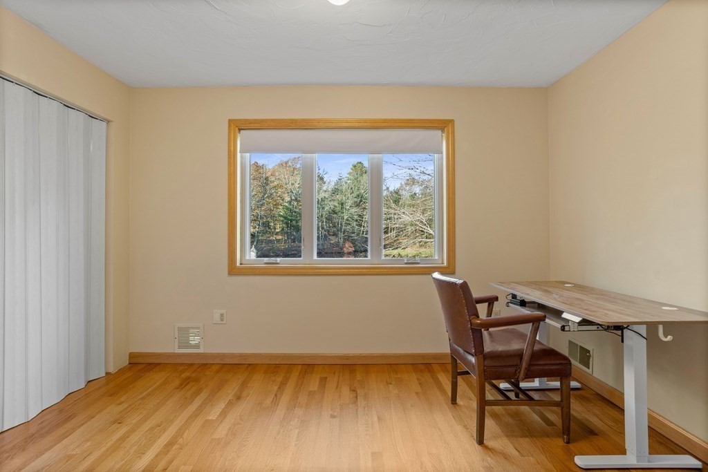 115 South Meadow Road Lancaster, MA 01523 - Photo 29 of 42 a view of a room with wooden floor and a window