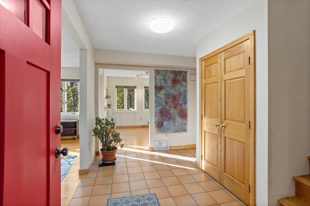 115 South Meadow Road Lancaster, MA 01523 - Photo 4 of 42 a view of a entryway door of the room