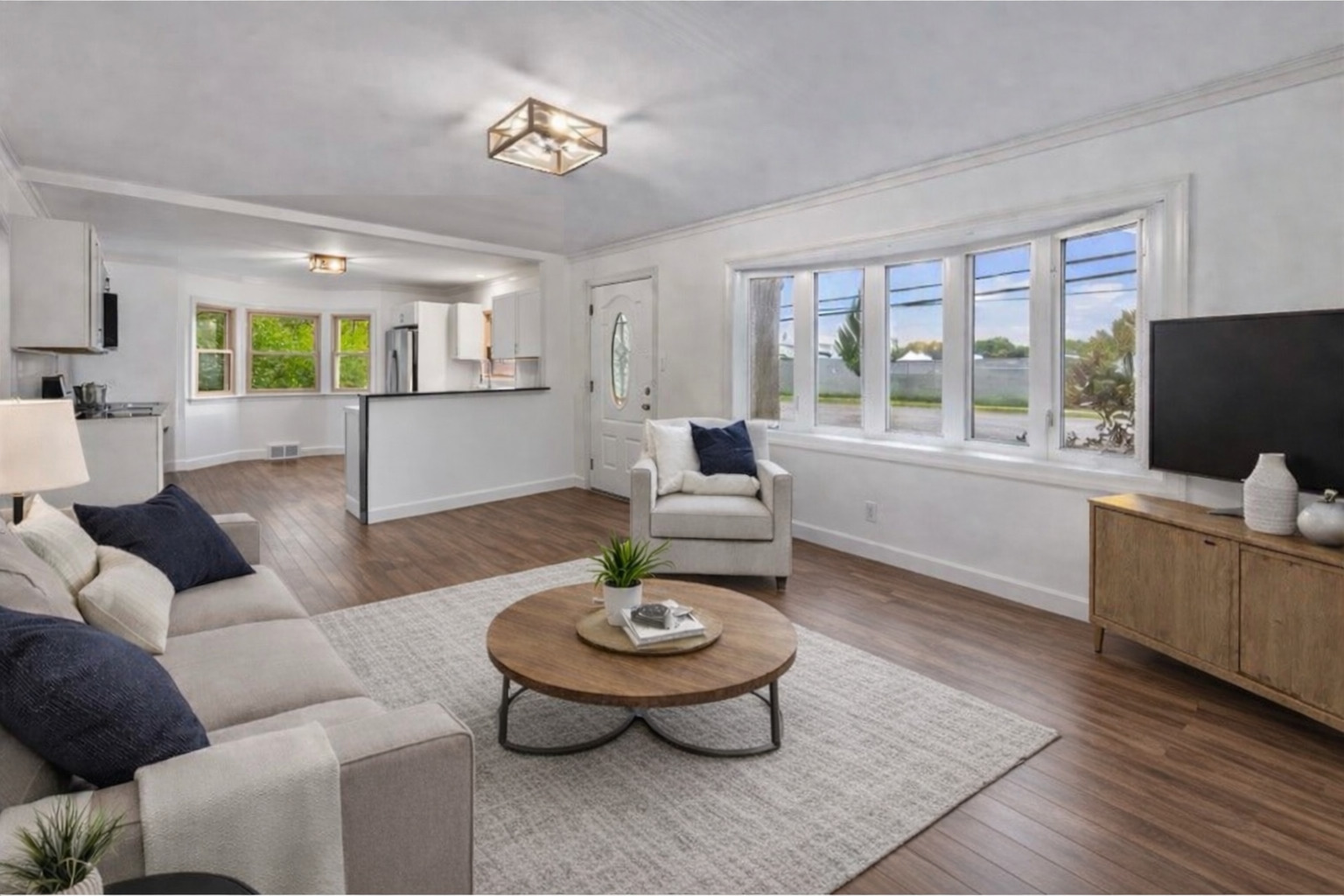 3019 Lincoln Road McHenry, IL 60051 - Photo 3 of 28 a living room with furniture and a flat screen tv