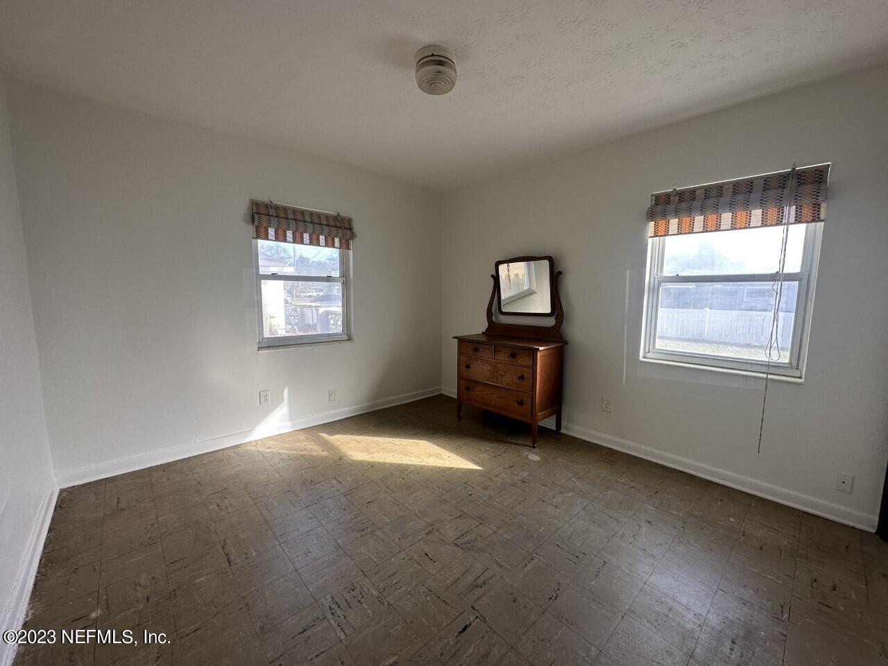 6021 Colgate Road Jacksonville, FL 32217 - Photo 17 of 32 a view of an empty room with a window