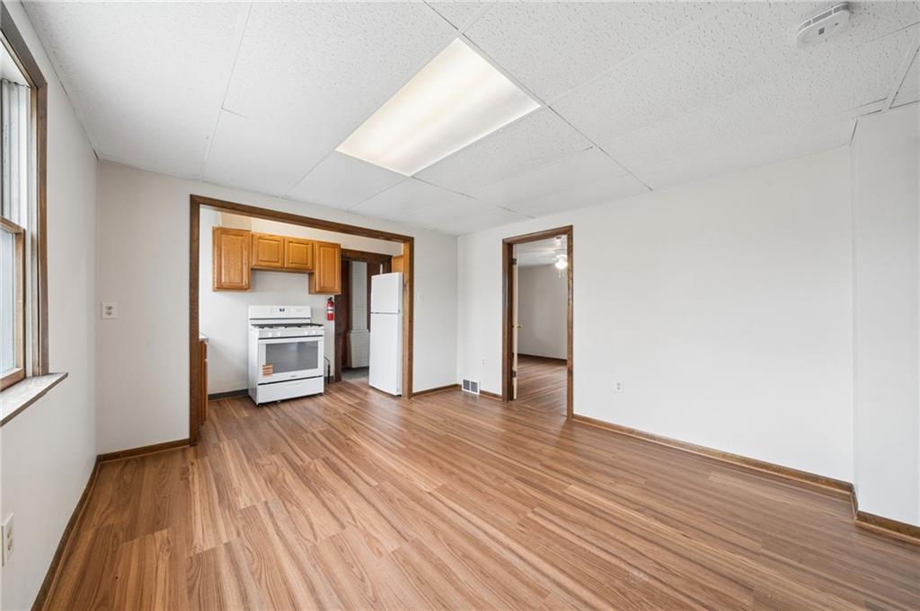 504 Fair Oaks Street McKees Rocks, PA 15136 - Photo 8 of 35 This versatile space could be a dining area, family room, or used for a kitchen expansion.