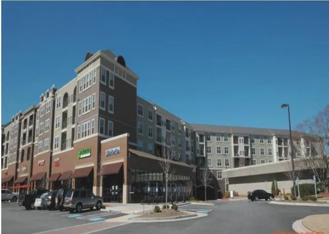 a view of a building and a street