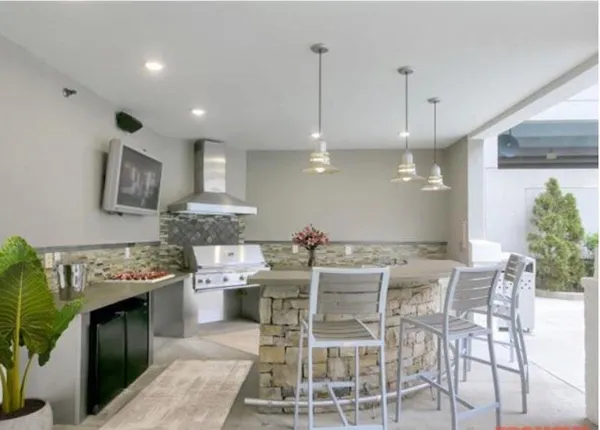 a kitchen with a table and chairs in it