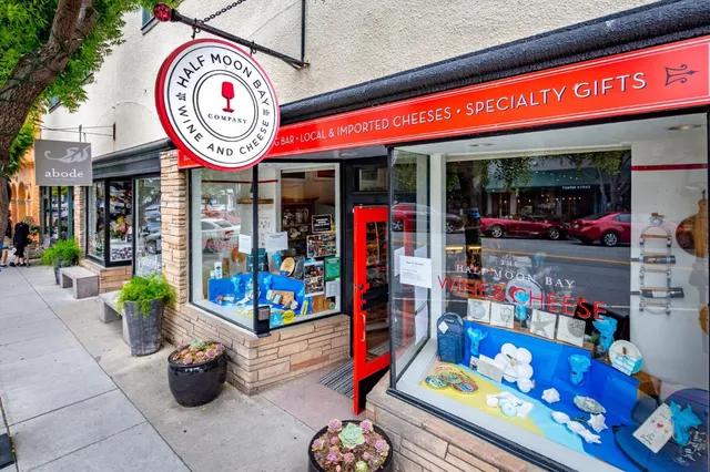 a store area with lots of fruit and vegetables