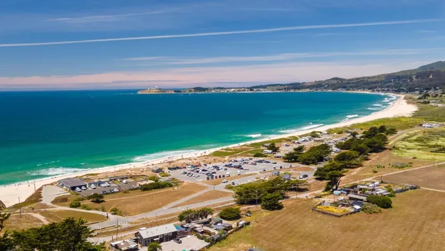 a view of a ocean with beach