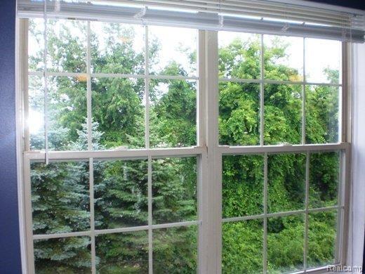 3088 High Pointe Ridge Road, Unit 44 Lake Orion, MI 48359 - Photo 3 of 18 Wooded View from Dining!.jpg