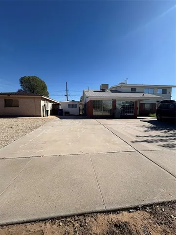 a view of a terrace with chairs