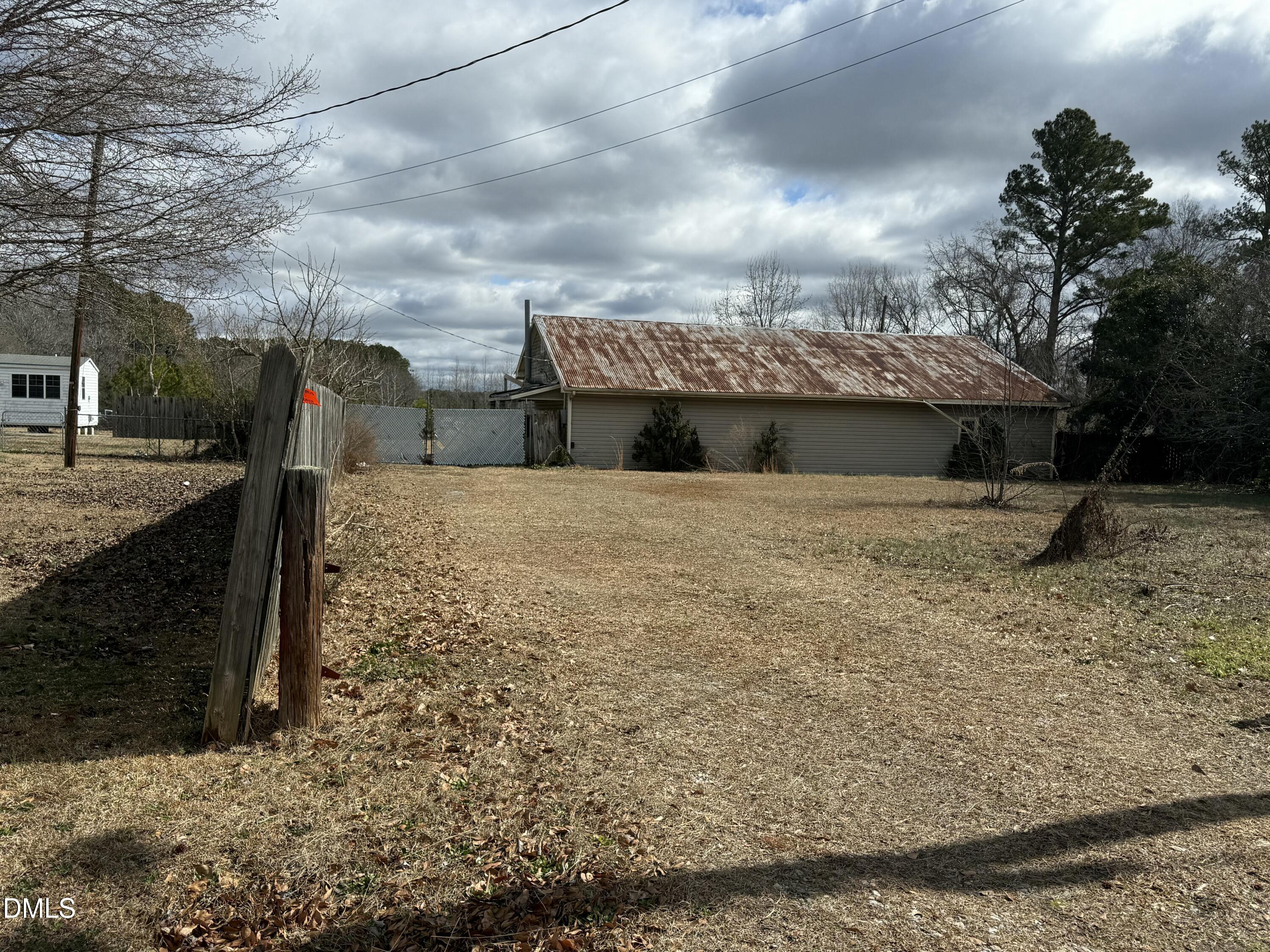 747 Raiford Road Erwin, NC 28339 - Photo 3 of 4 a view of a house with a snow