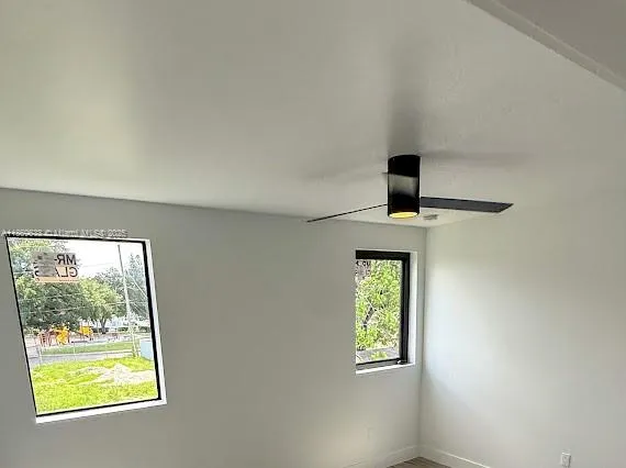 an empty room with windows