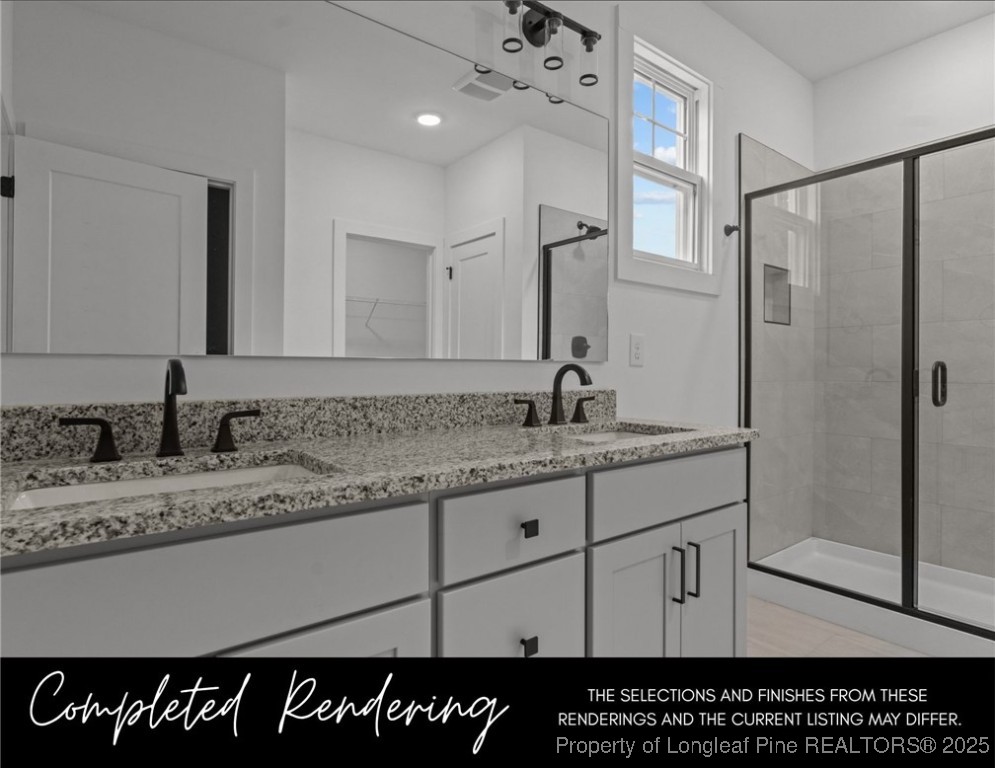 3563 Philippi Church Road Raeford, NC 28376 - Photo 7 of 11 a bathroom with a sink and a mirror