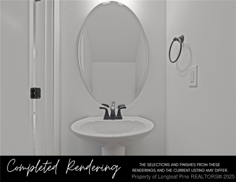 3563 Philippi Church Road Raeford, NC 28376 - Photo 10 of 11 a bathroom with a sink and a mirror