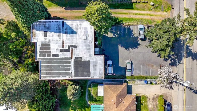 an aerial view of house with yard