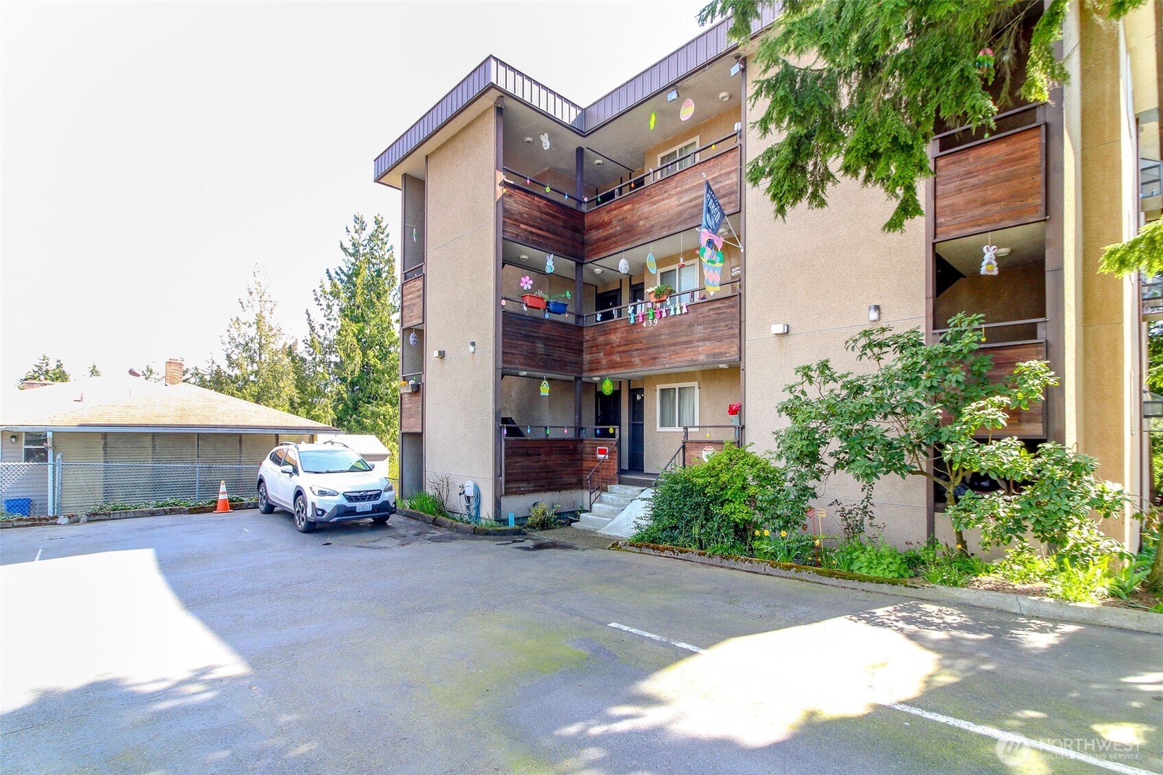 439 Southwest 156th Street Burien, WA 98166 - Photo 2 of 17 a car parked in front of a building