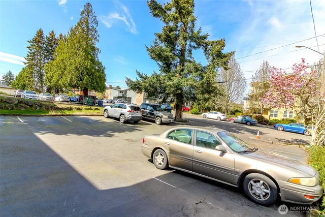 a view of parking with cars parked