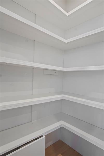 7945 Garnet Trace Ball Ground, GA 30107 - Photo 15 of 73 a view of an empty walk in closet