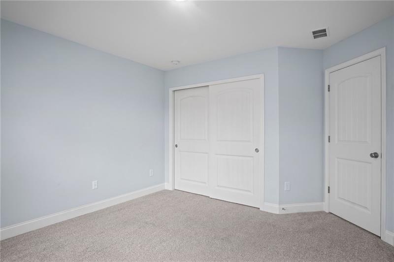 7945 Garnet Trace Ball Ground, GA 30107 - Photo 34 of 73 a view of an empty room