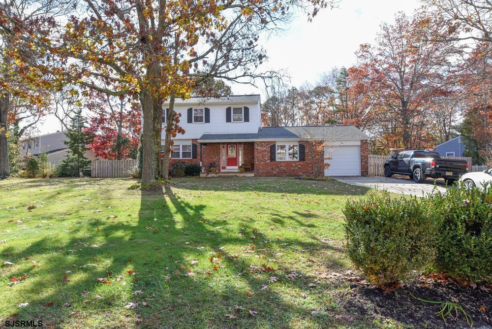 10 Williams Way Ocean View, NJ 08230 - Photo 1 of 28 a front view of a house with a yard