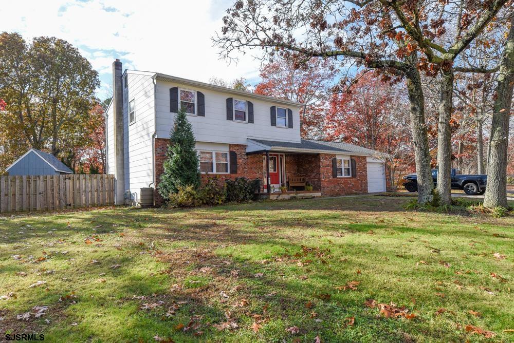 10 Williams Way Ocean View, NJ 08230 - Photo 2 of 28 a front view of a house with a yard