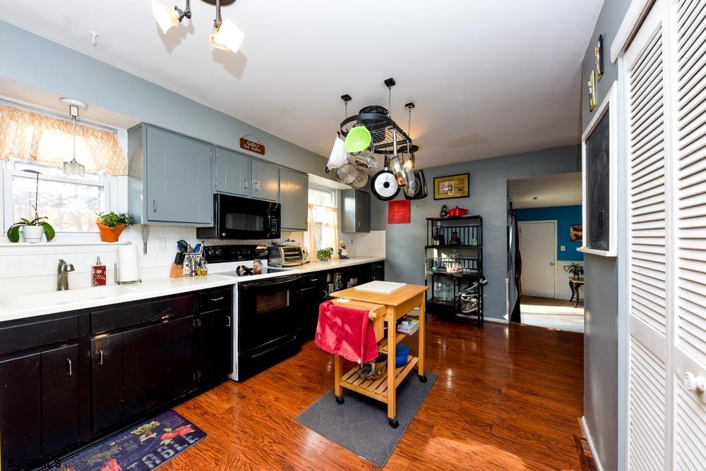 10 Williams Way Ocean View, NJ 08230 - Photo 17 of 28 a kitchen view of microwave a stove and cabinets