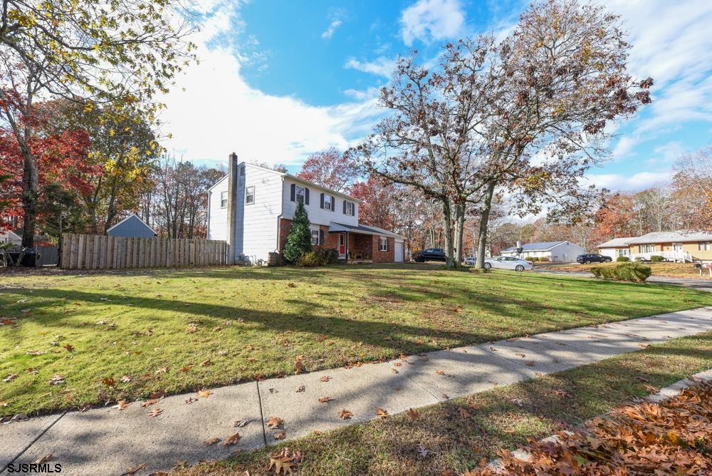 10 Williams Way Ocean View, NJ 08230 - Photo 3 of 28 a view of a fountain in front of a house with a big yard