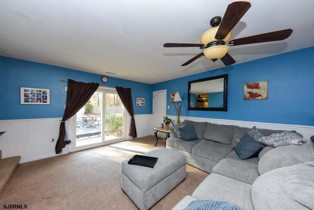 10 Williams Way Ocean View, NJ 08230 - Photo 21 of 28 a living room with furniture and a large window